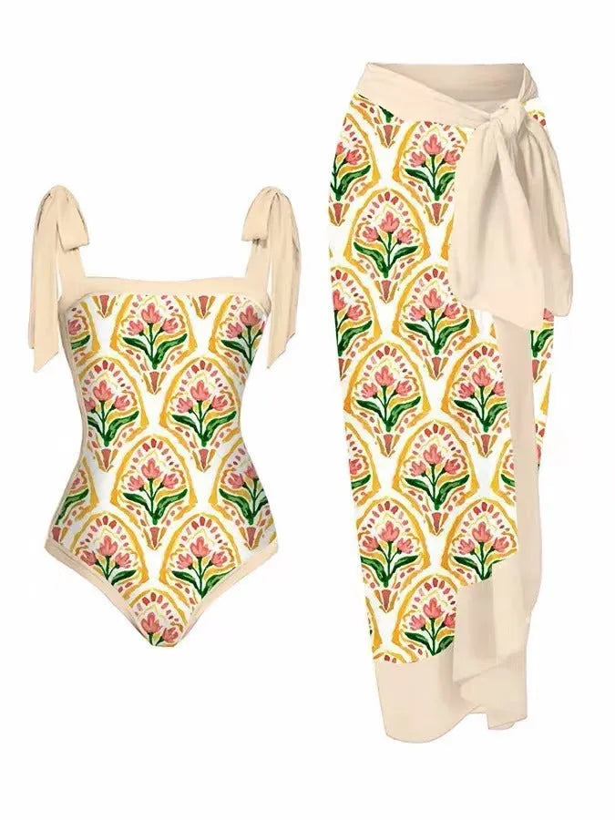 Women's printed chiffon two-piece swimsuit set with a separate hip skirt.