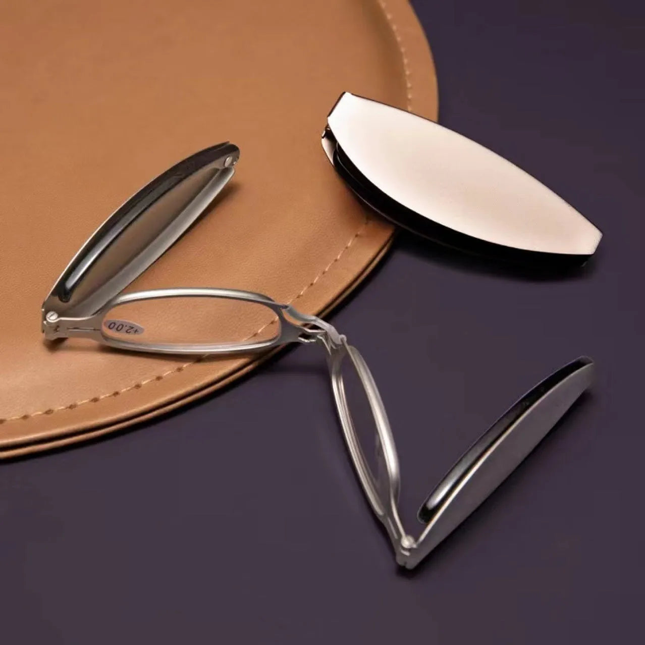 Folding presbyopic reading glasses with retro metal frame shown open and folded in pocket case
