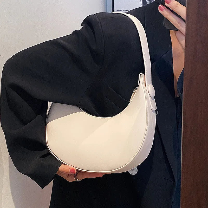 Women's retro shoulder bag in dumpling shape with sandwich pocket and zippered compartment