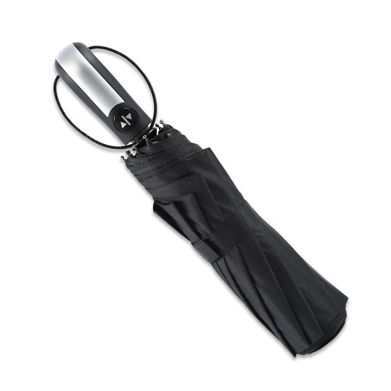 Automatic open triple folding business umbrella in black colour showing steel rib construction