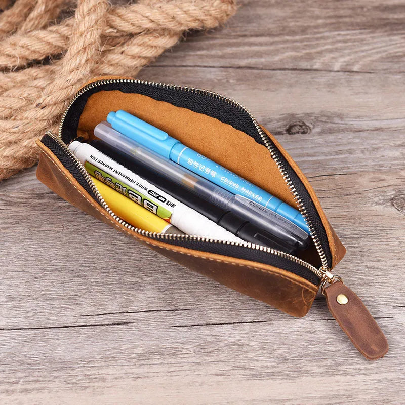 Handmade square leather pencil and glasses case with zipper, shown in black colour.