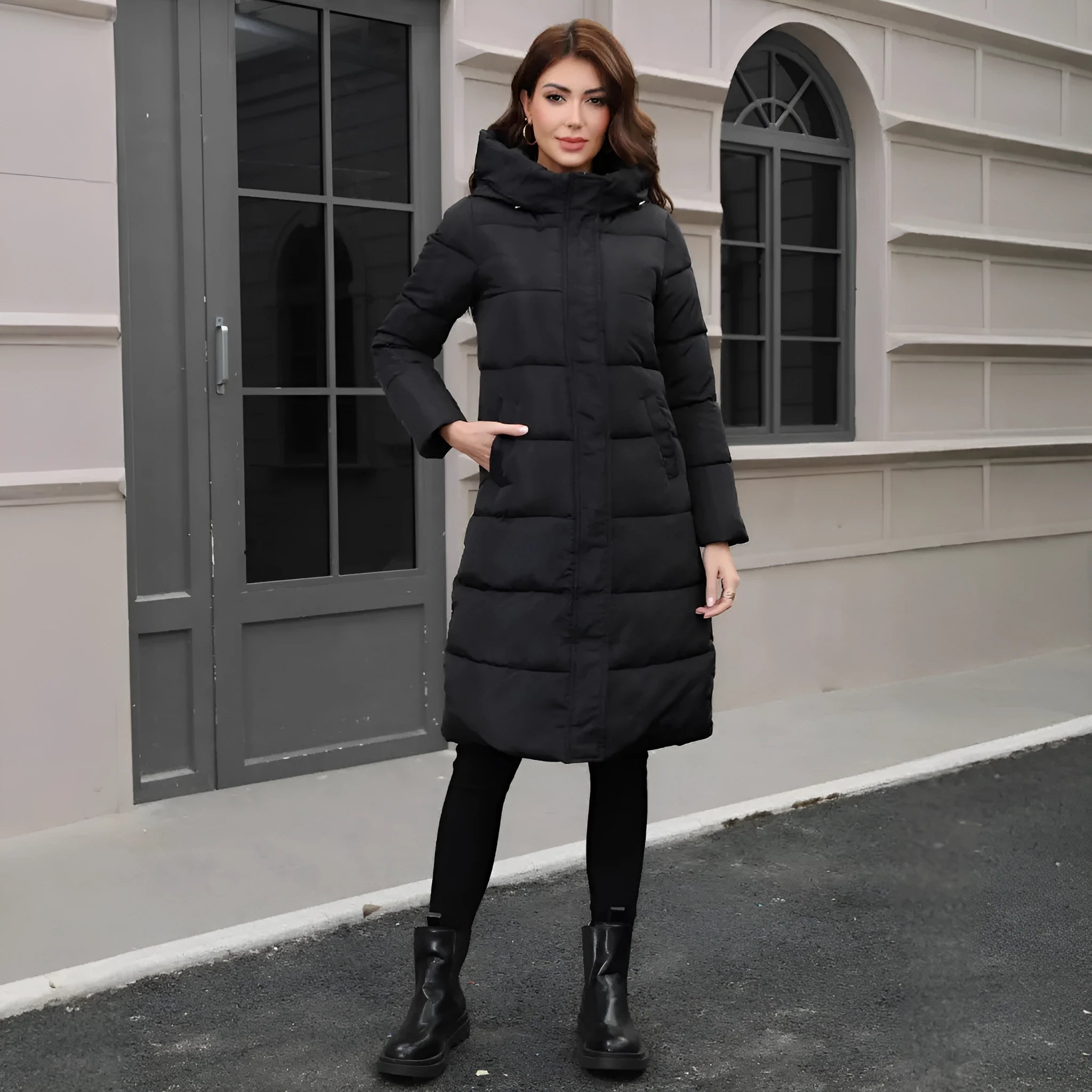 Black hooded slim fit winter jacket with regular sleeves on mannequin
