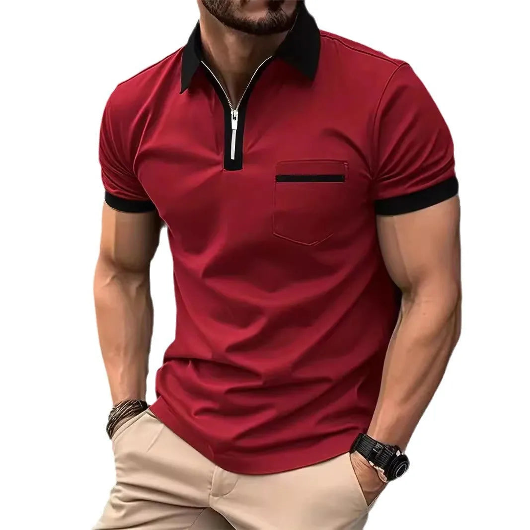 Man wearing a loose-fit casual short sleeve shirt with a chest pocket and zipper decoration.