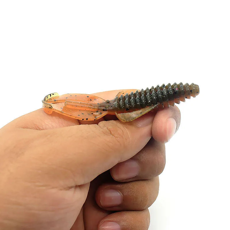PVC soft plastic fishing lure in two sizes: a smaller 8cm and a larger 12cm model, shown in a selection of colour variations.