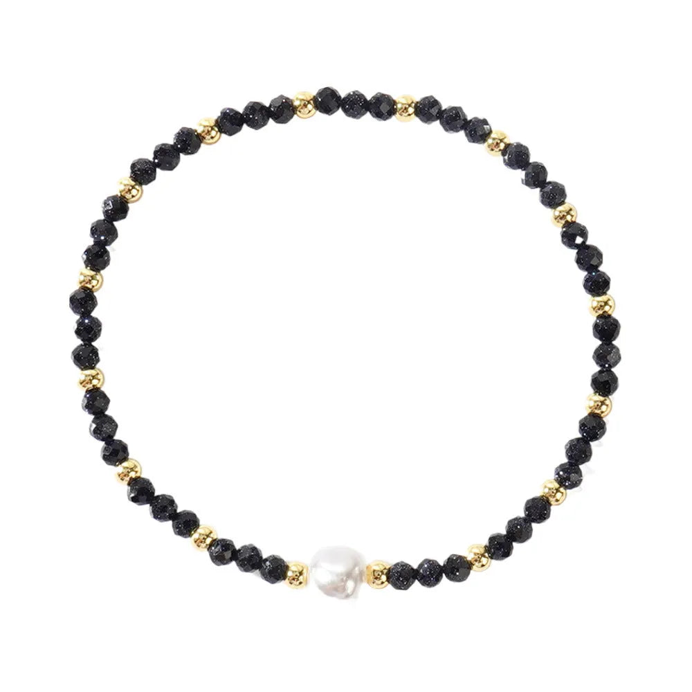 A geometric natural stone bracelet with an ellipse detail, shown in one of fifteen available colour options.