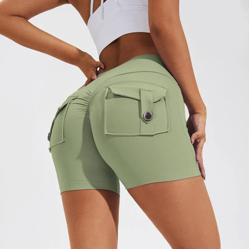Women's high waist fitness shorts with pockets in avocado green colour for yoga and workouts