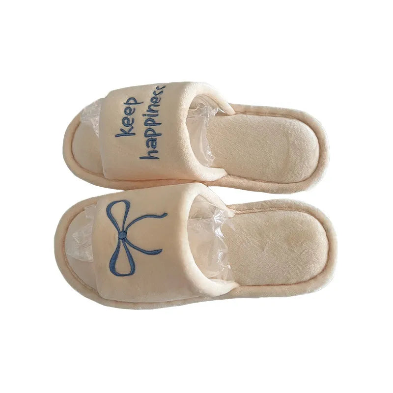 Ladies cotton slippers with bow and English letter pattern in beige yellow colour flat bottom