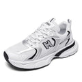 Men's white and grey mesh running shoes with round toe and plastic sole.