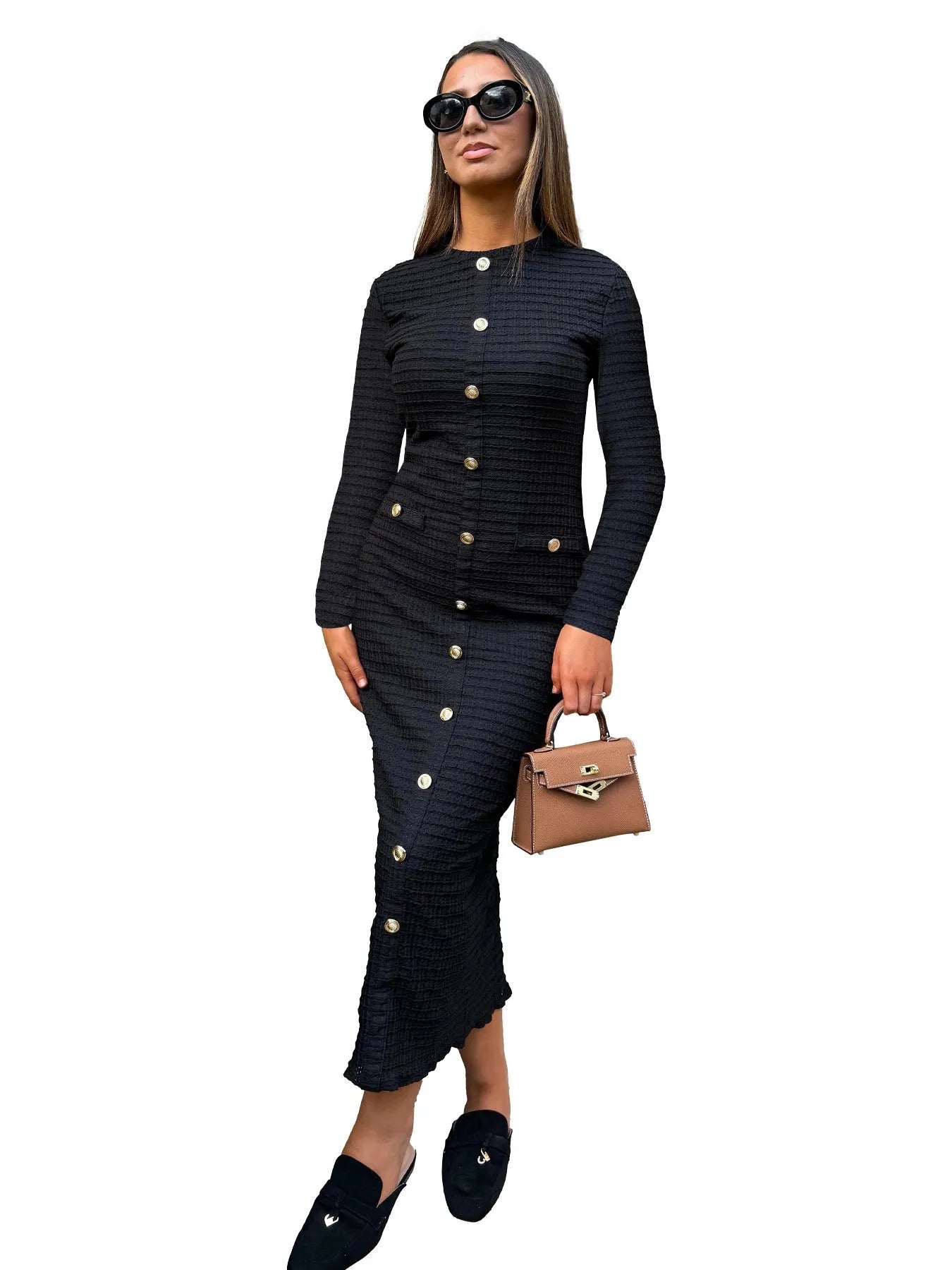 French retro slim fit knitted long-sleeved pullover dress in black with button accents and a one-step skirt.