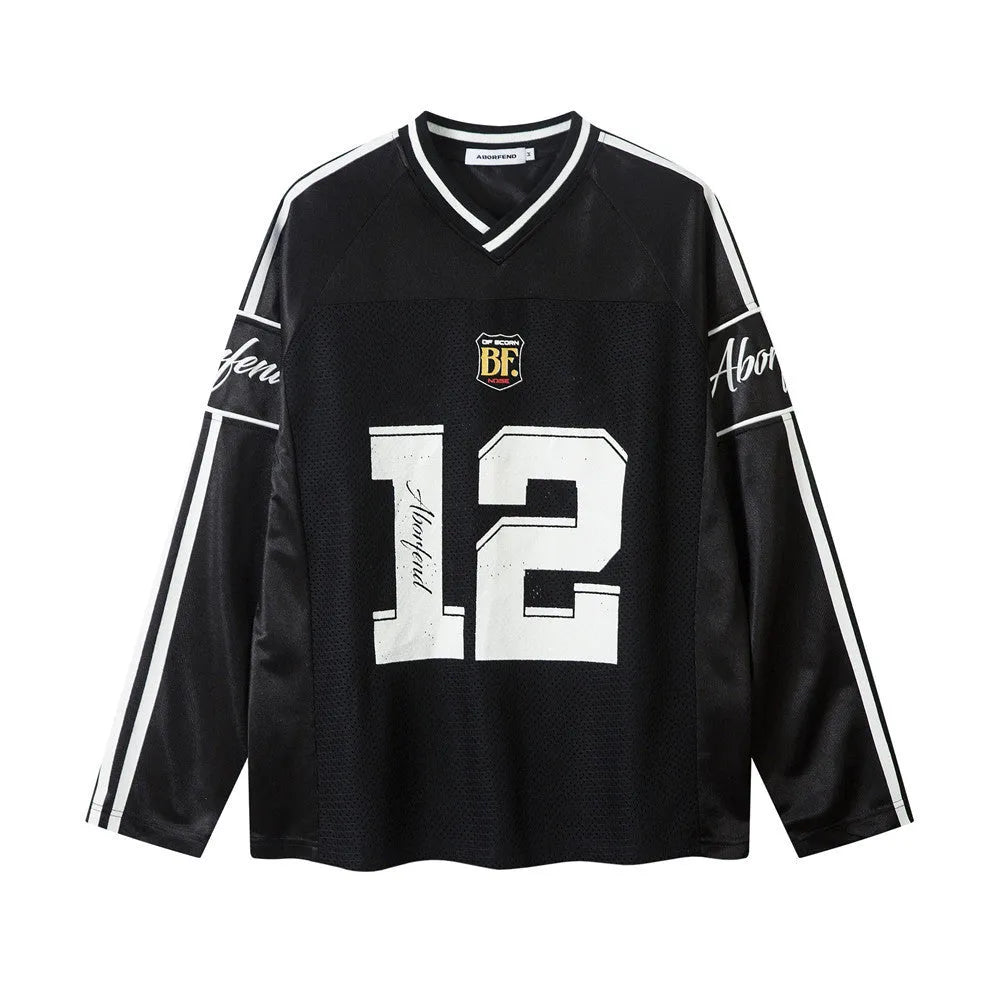 Men's black loose-fit long-sleeved t-shirt with digital print and V-neck collar on a white background.