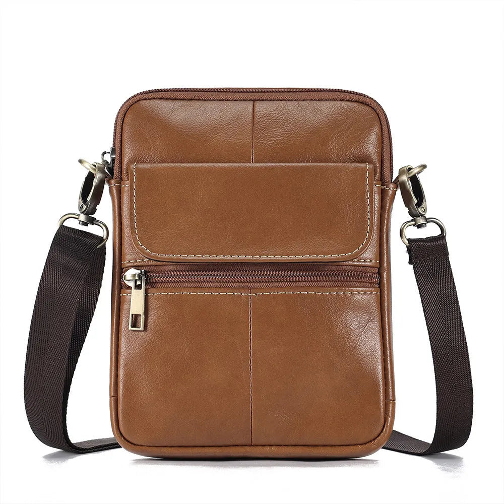 Men's brown genuine leather crossbody shoulder bag showing sewing line details.
