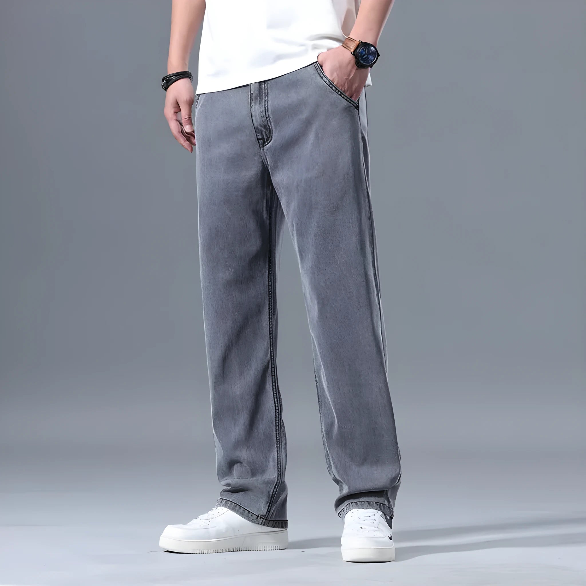 Men's loose straight-leg lyocell jeans in blue and grey colour options with zipper fly