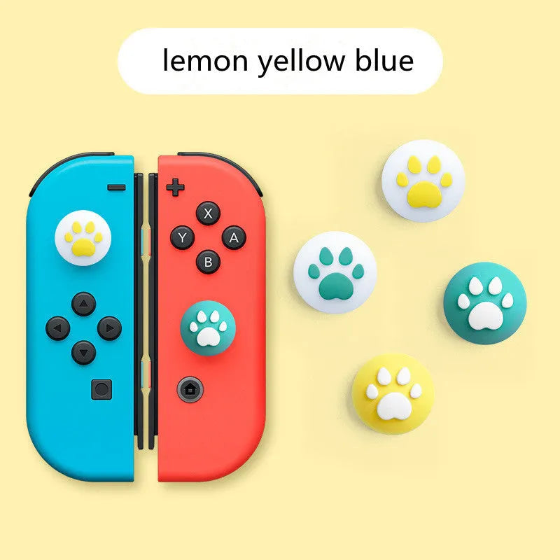 Four silicone rocker caps for Nintendo Switch Joy-Con controllers in assorted colours on a grey background.