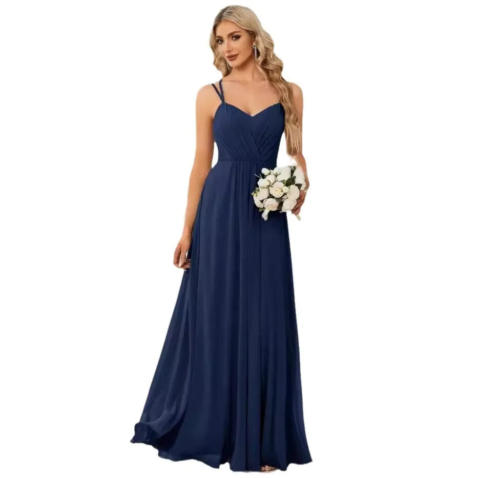 Women's long sleeveless A-line pleated dress in light green for banquet or casual wear.