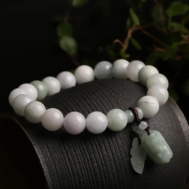 Adjustable natural jade bracelet with geometric pendant and symbolic apple, Maitreya, gourd, and money bag charms.