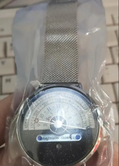 Men's gold sport watch with 40mm dial and stainless steel strap showing 24-hour display