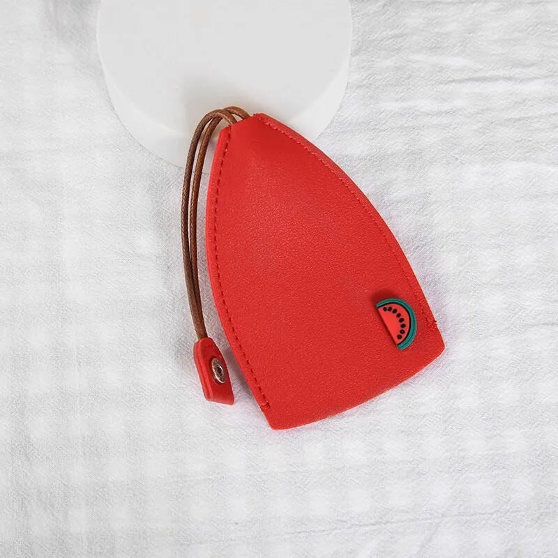 Cartoon design pull-out car key case made from soft PU leather, showing approximate size.