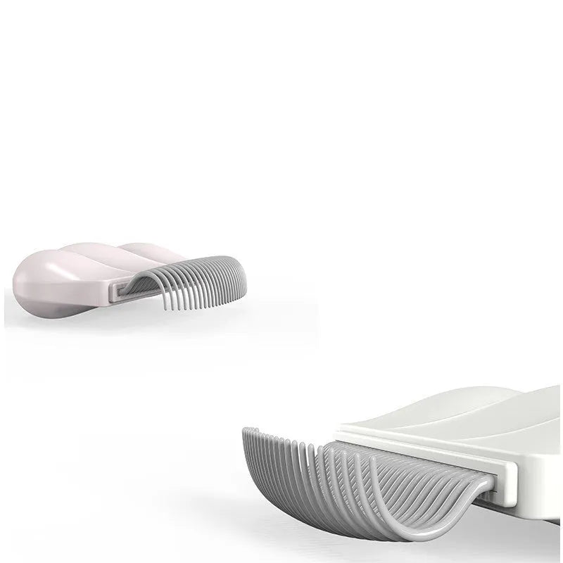 Paw Soft Deshedding Brush grooming tool for cats and dogs in blue, pink, or white on a white background.