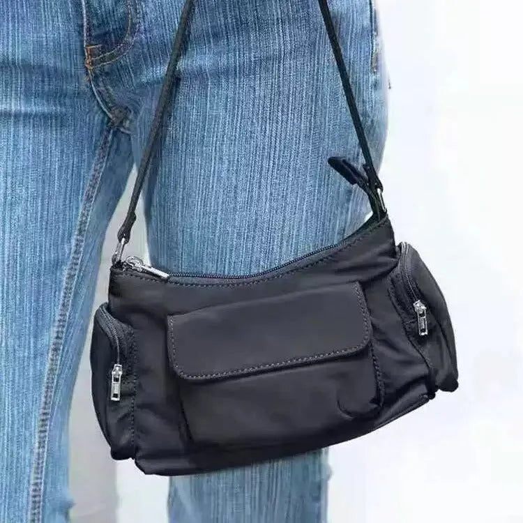 Simple black lightweight nylon shoulder bag with two front pockets