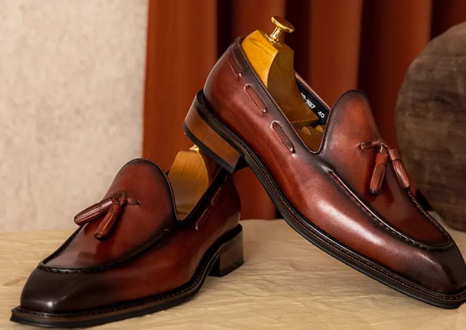 Men's black and brown genuine leather slip-on loafers with pigskin lining and rubber sole