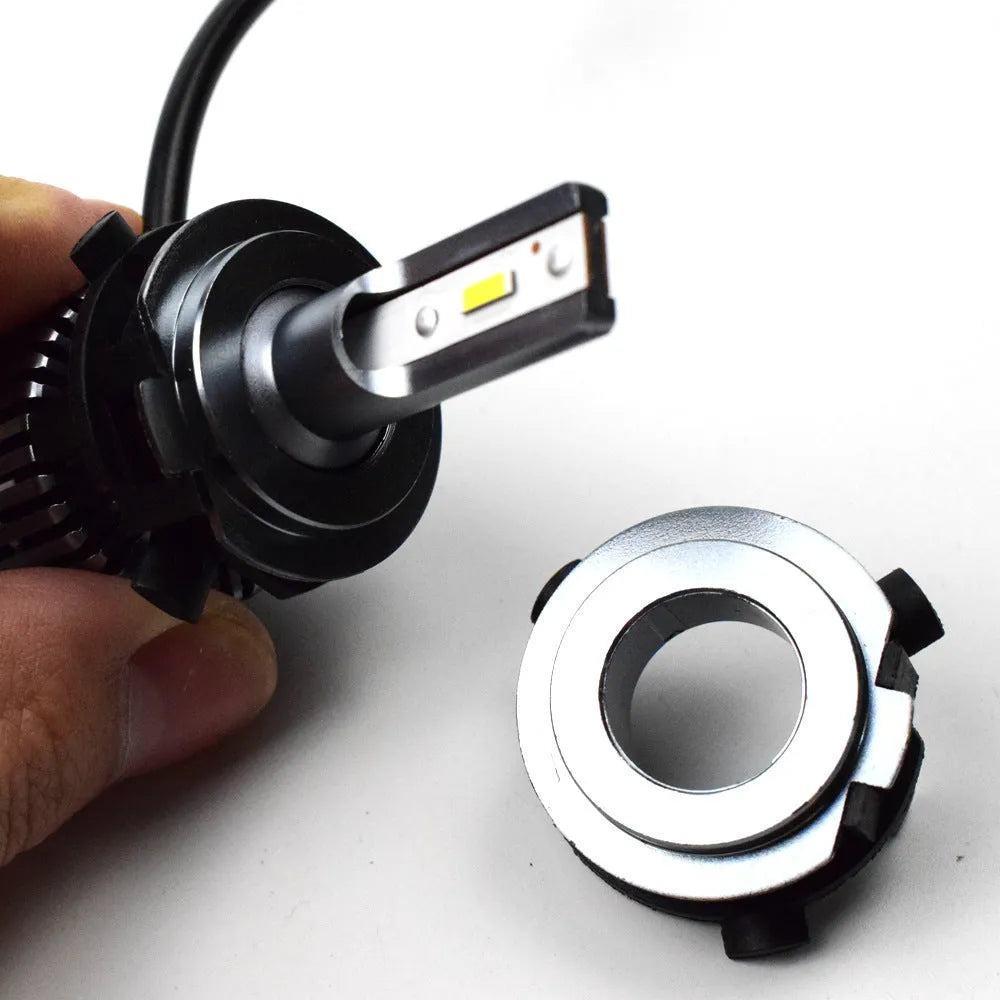 Black ABS plastic card holder for car LED headlight, shown next to a parking card.