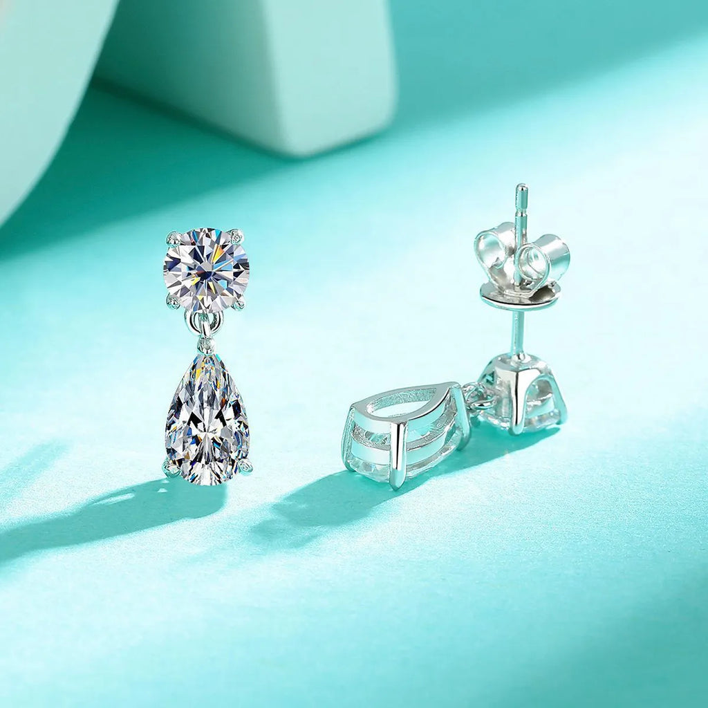 Water drop moissanite stud earrings in 925 sterling silver with round and geometric shapes