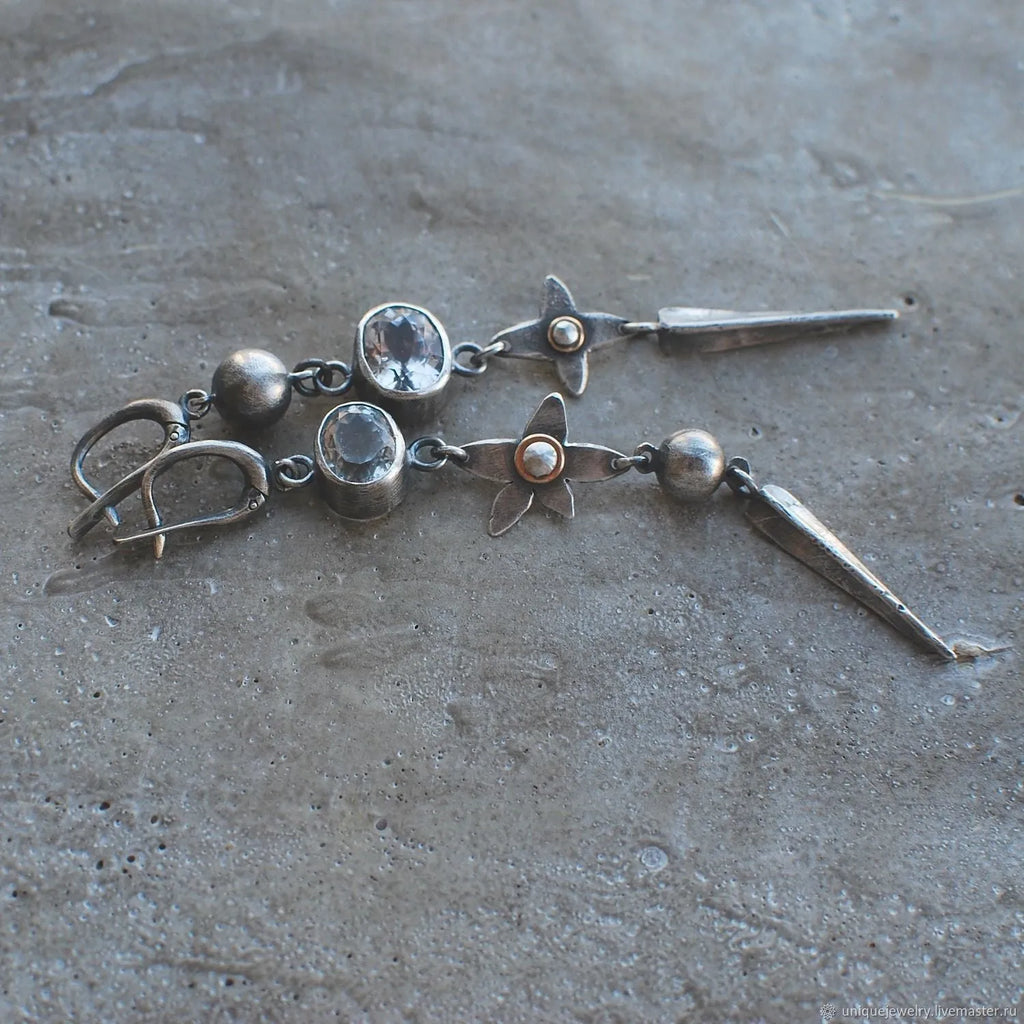 Pair of long geometric pendant earrings with rhinestones in antique silver colour
