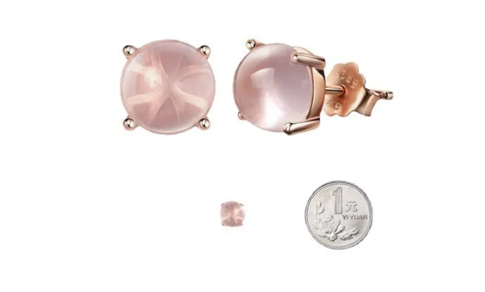 Rose gold drop shape stud earrings with synthetic ross quartz crystal inlay detail