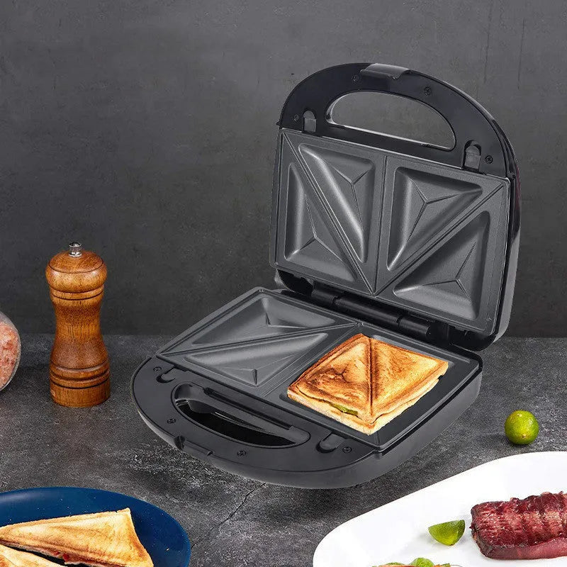 Black electric sandwich pan with double-sided heating and brushed stainless steel cover