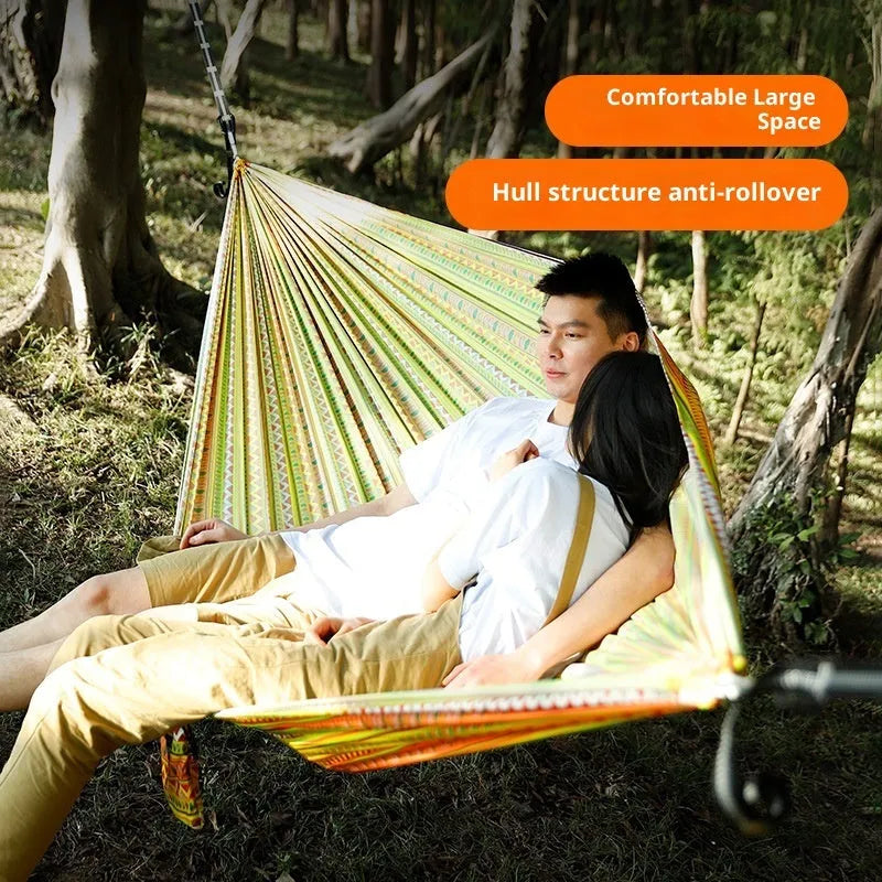Outdoor parachute cloth hammock in bohemian yellow print, laid flat on grass, 260x140cm size