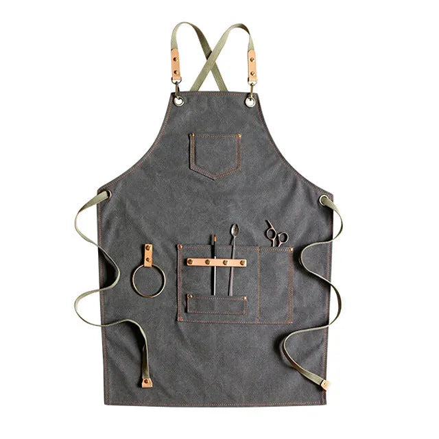 Canvas apron with cross back straps in camel colour for cafe and baking workwear