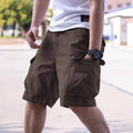 Men's loose-fitting cotton blend shorts in army green with a retro workwear style.