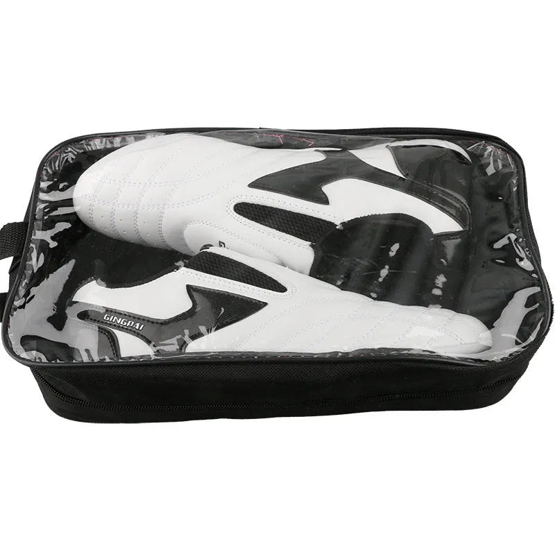 Black and white children's boxing shoes with soft bottom construction for martial arts training