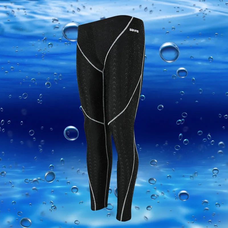 Men's nylon cropped swimming trunks in black with contrast line pattern for athletic swimming and fitness