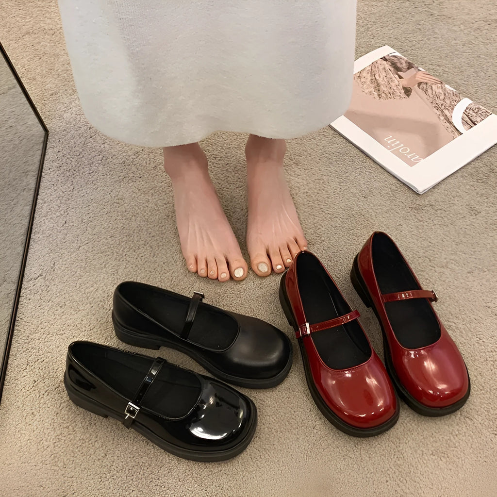 Women's red French vintage flat shoes with round toe and solid colour PU upper.