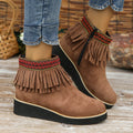 Women's wedge boots with suede upper, waterproof platform, thick rubber sole, side zip, and tassel detail