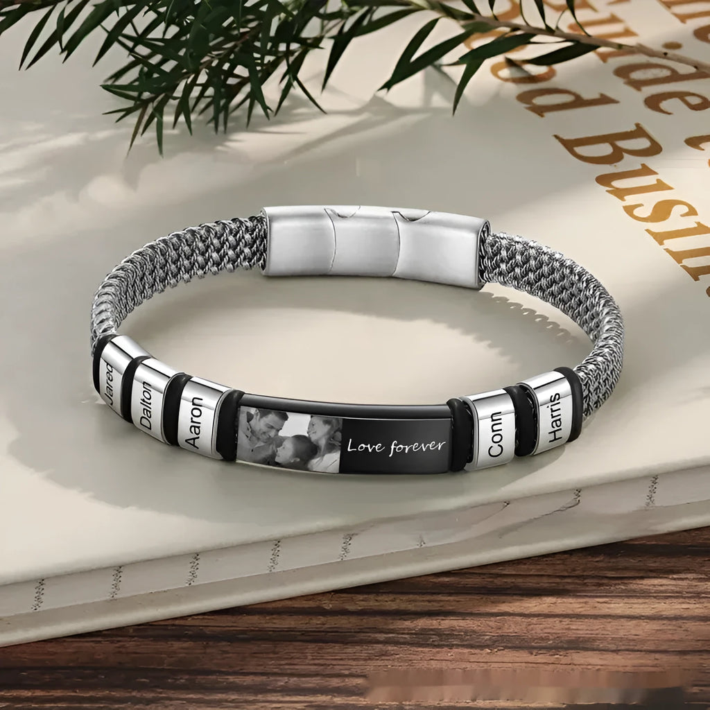 Men's titanium steel and leather rope bracelet with heart shape and bead lettering options in a gift box.