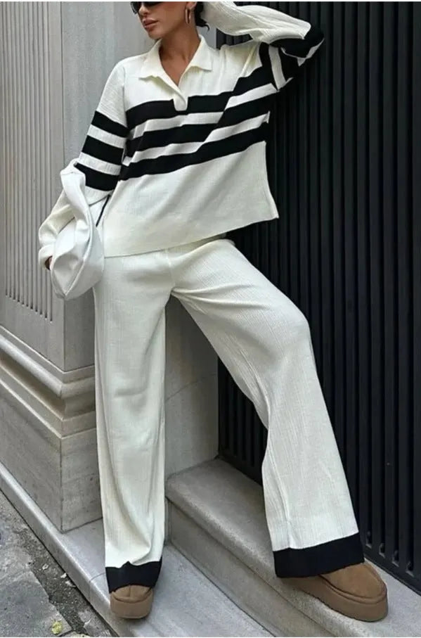 Women's black and white striped knitted polo shirt with matching trousers two-piece set