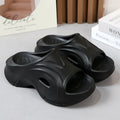 Women's thick-soled beach slippers in white, black, and rose red colours with EVA construction