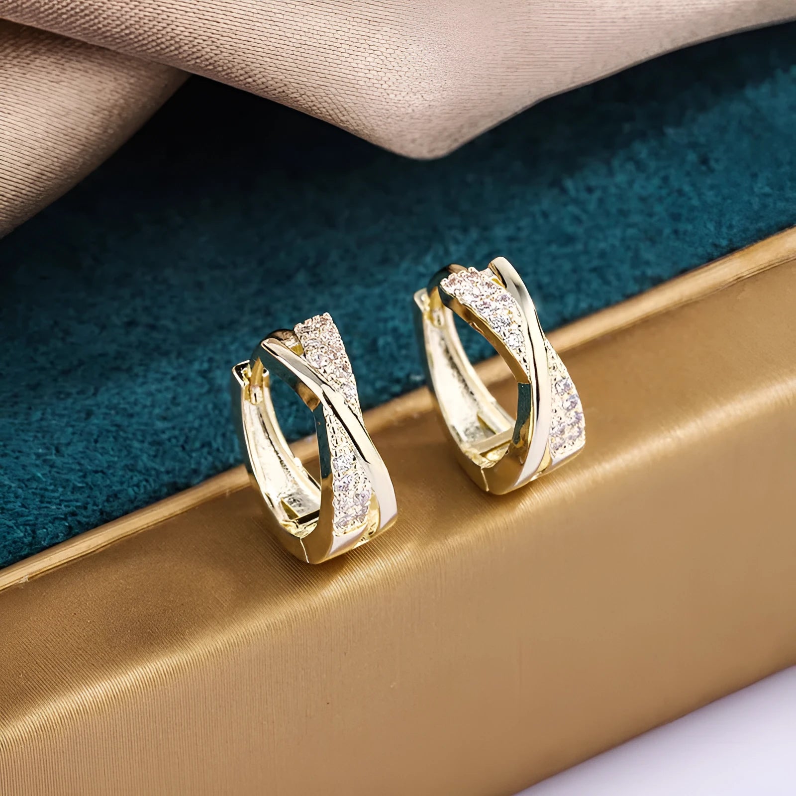 14K yellow geometric copper earrings with zircon accent on white background
