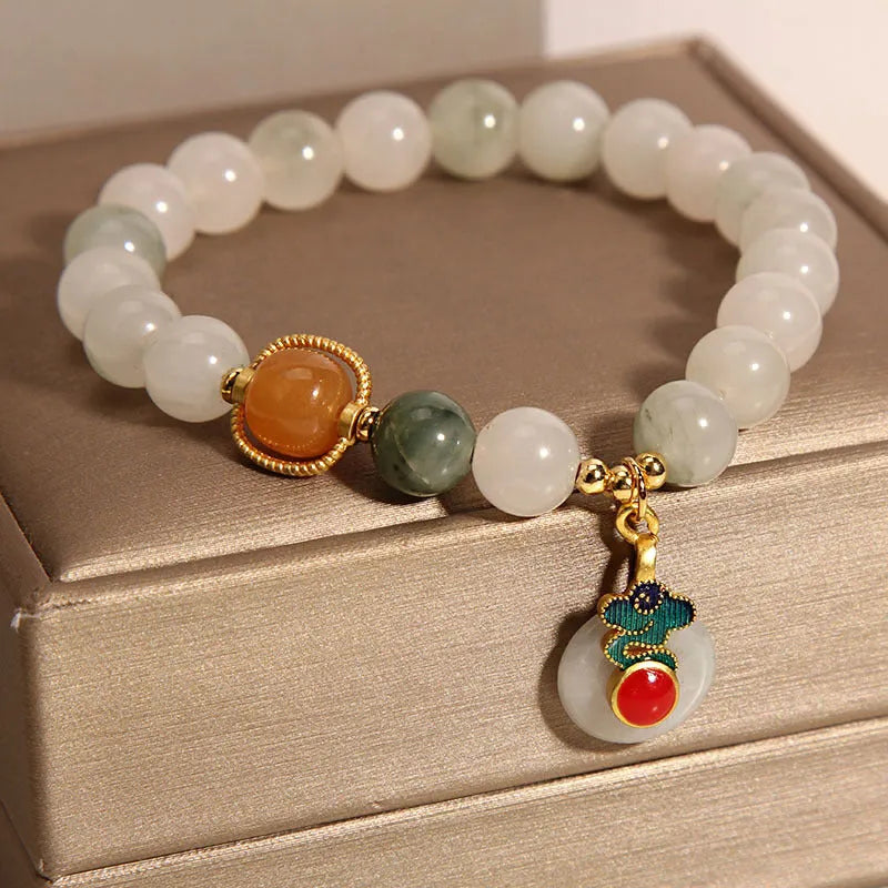 Women's ice jade crystal bracelet with Xiangyun peace buckle and pearl decorative elements