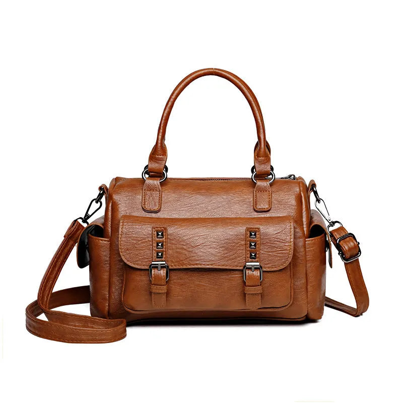 Vintage-style large messenger bag in PU leather, showing horizontal square shape and contrast stitching.