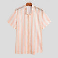 Pink men's loose-fit waffle texture short-sleeve casual shirt on a hanger