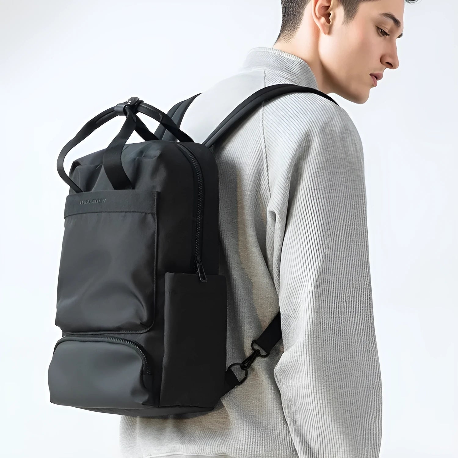 Elegant black computer backpack with Oxford cloth exterior and 20-35L capacity