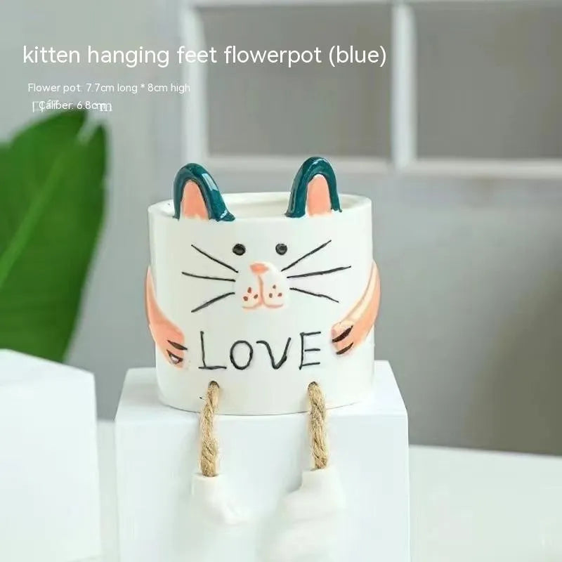 Ceramic hanging foot flowerpot with cartoon design for succulent plants on desktop