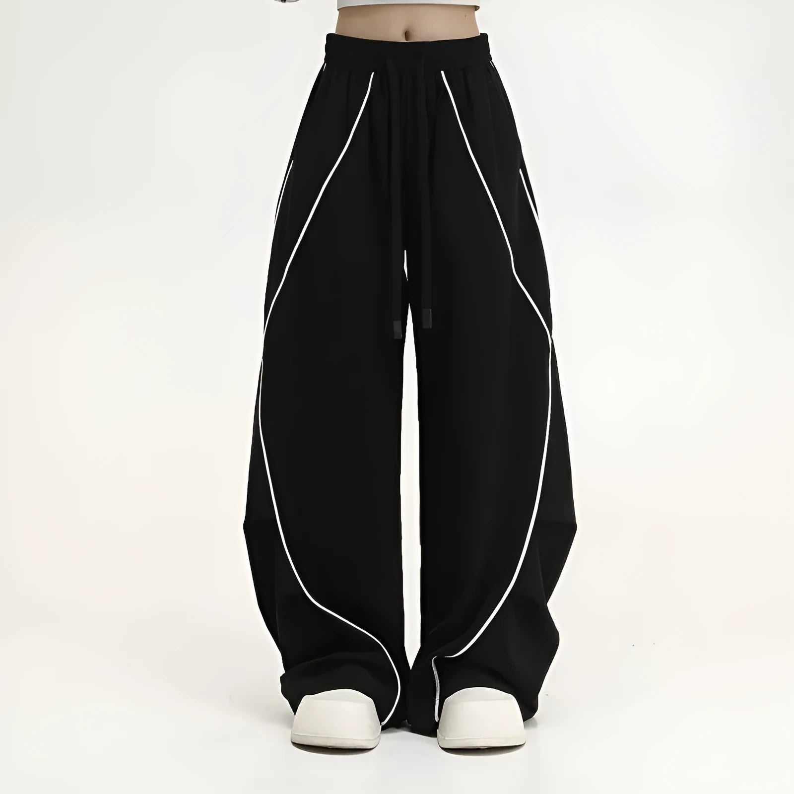 Black pleated hip hop trousers with wide-leg design and stripe pattern