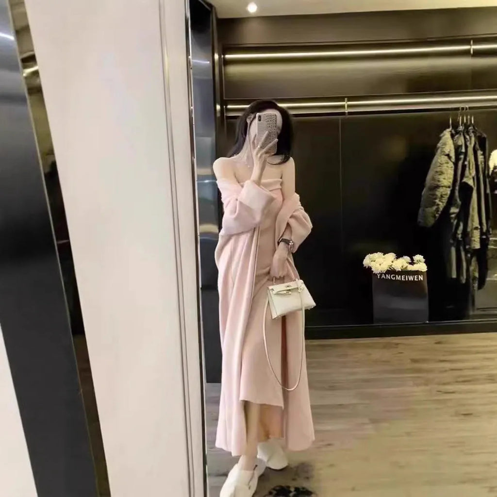 Women's grey knitted cardigan dress sweater suit two piece set with long skirt and regular sleeves.
