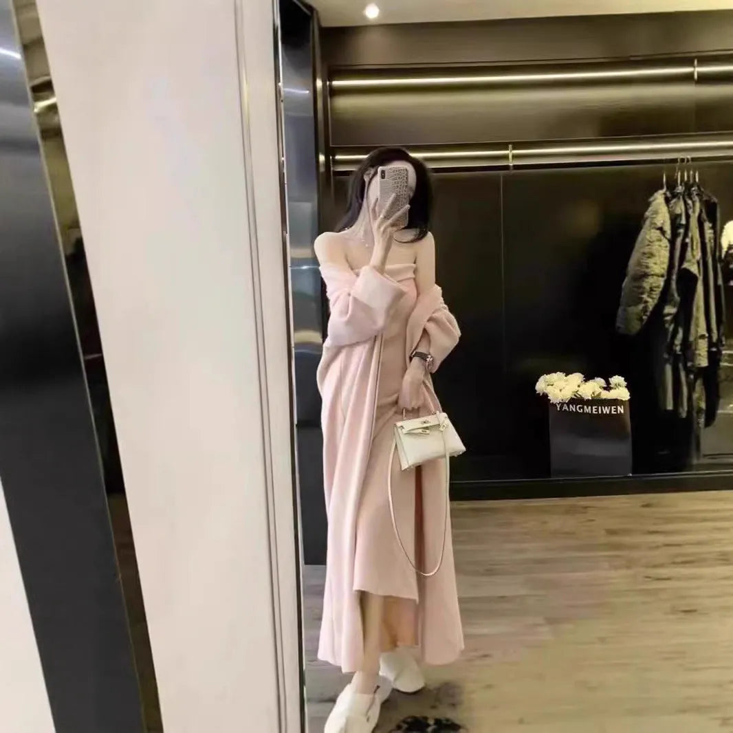 Women's grey knitted cardigan dress sweater suit two piece set with long skirt and regular sleeves.