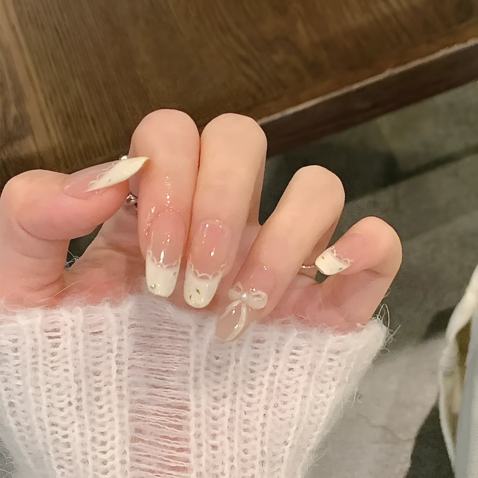 False nails with gel polish finish in assorted colours and patterns