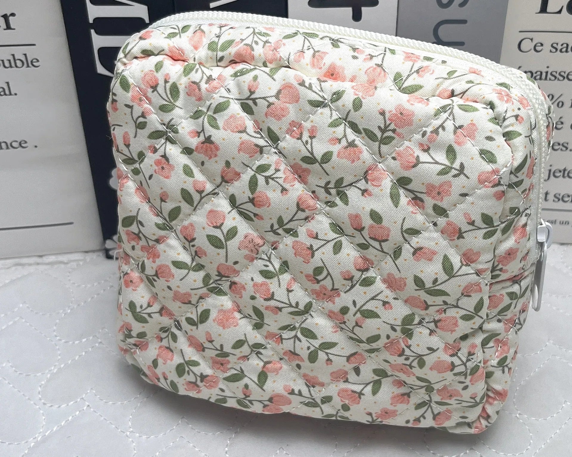 Breathable polyester key storage bag showing multiple floral and cherry pattern options including white background designs